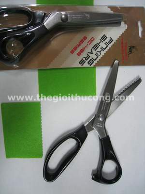 Kéo răng cưa cắt vải lọai 1