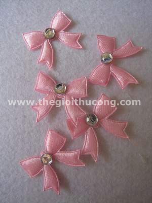 Nơ vải hồng đính cườm 