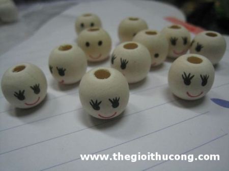 Gỗ tròn bi hình mặt vui, buồn