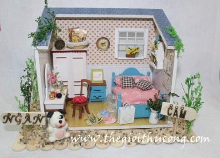 Mô hình nhà gỗ và que kem