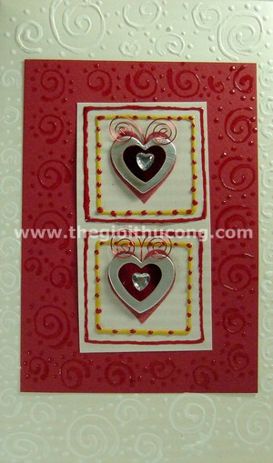 Thiệp 2 trái tim có móc xoắn